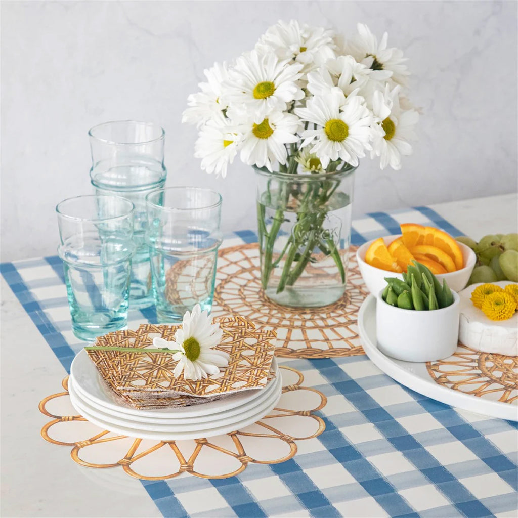 Paper basket print chargers and placemats on blue check paper runner on table