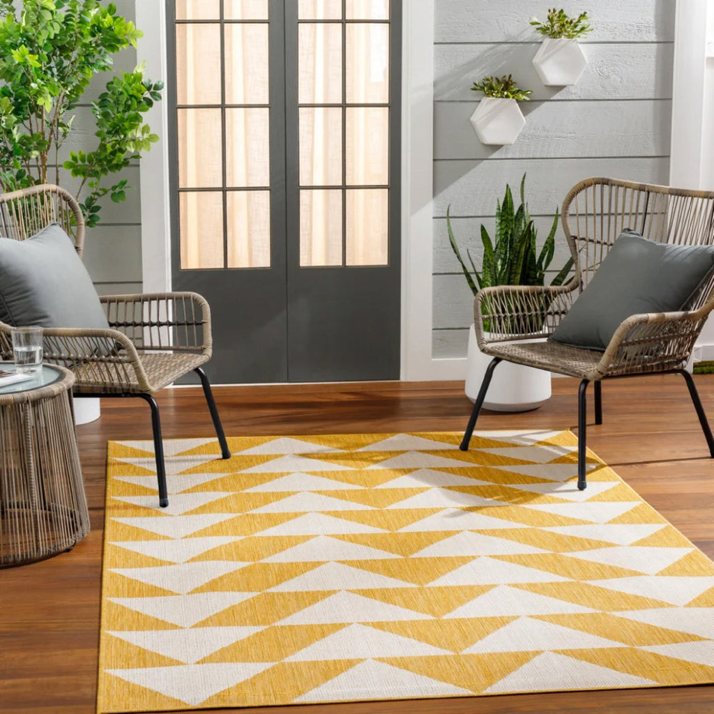 yellow white triangle outdoor rug