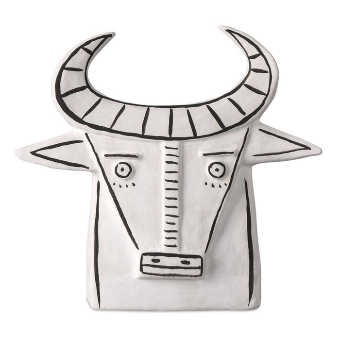 white porcelain cow sculpture open-backed black details