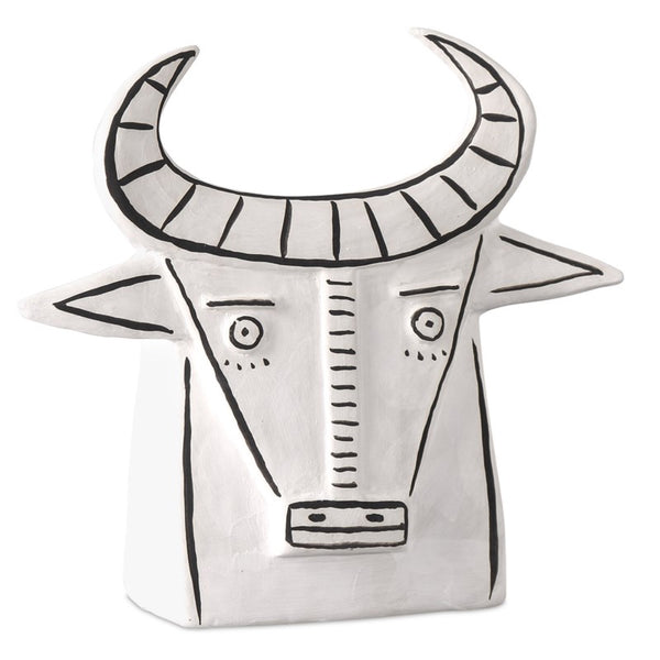 white porcelain cow sculpture open-backed black details