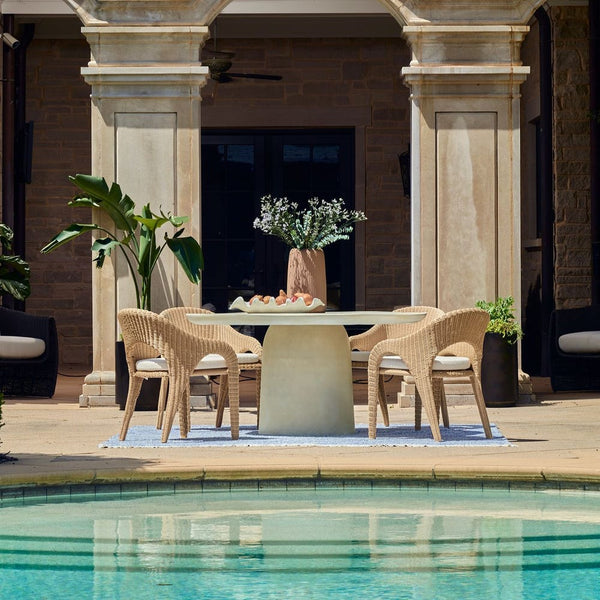 outdoor dining arm chair natural wicker frame white upholstered seat