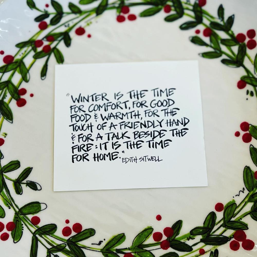 Card with winter quote surrounded by mistletoe design