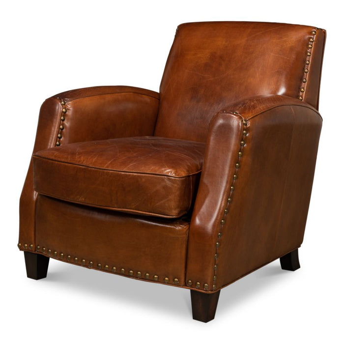 brown leather lounge chair nail heads