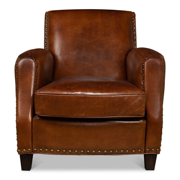brown leather lounge chair nail heads