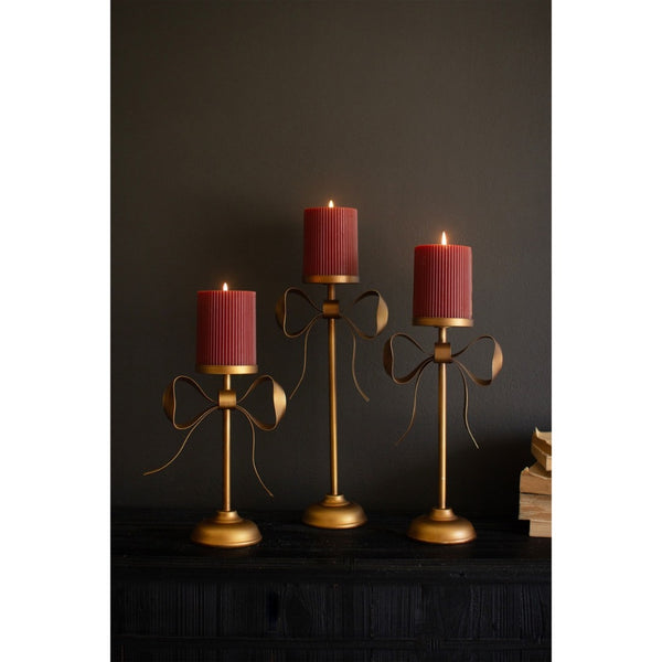 antique brass pillar candle holder bow set