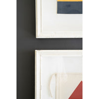 Close-up of Kalalou's Framed Nautical Canvas Flags (set of 4) adding charm to a dark wall.