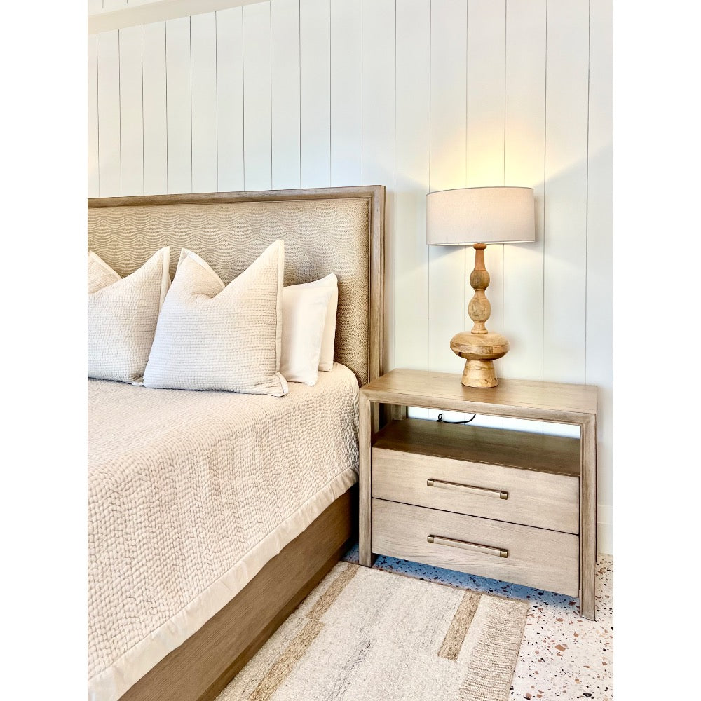 carved wood table lamp nightstand bed throw pillows