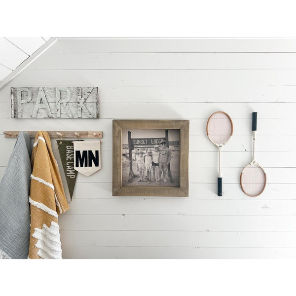 timberwood frame photo styled on wall