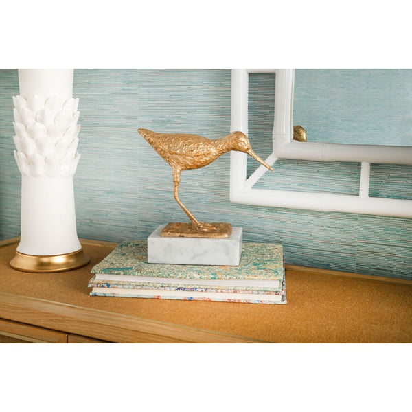 white marble base gold sculpture sandpiper bird