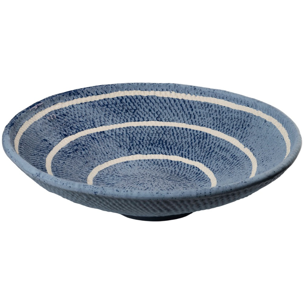 blue ceramic bowl off white circular stripes