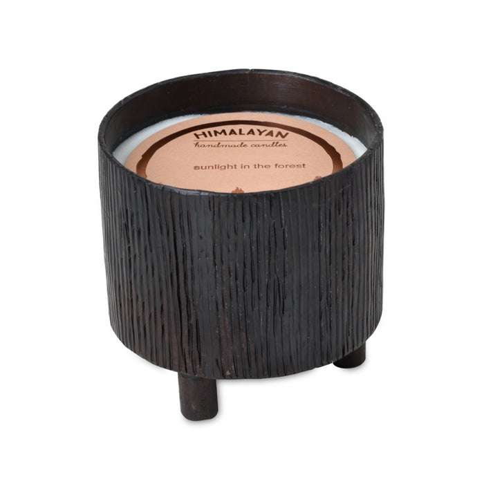 A Blacksmith Forged candle vessel by Himalayan Trading Post, cylindrical with legs, perfect for soy wax blend refills.