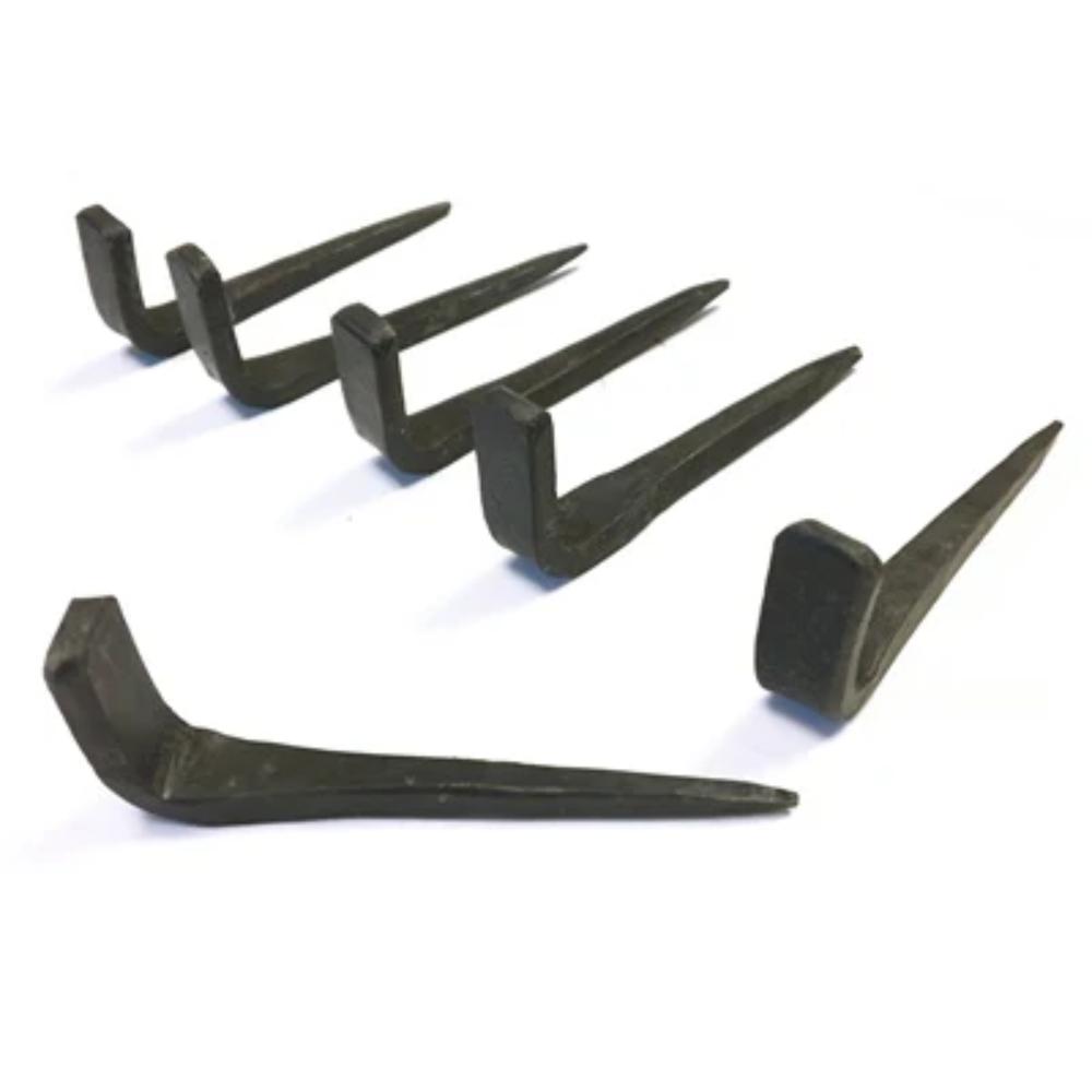 Set of black metal hooks on a white background