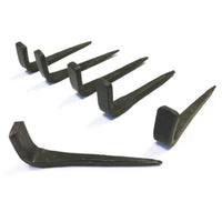 Set of black metal hooks on a white background