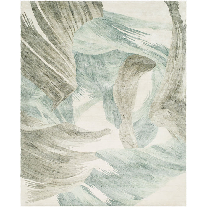 Rug with abstract leaf pattern in green and beige tones