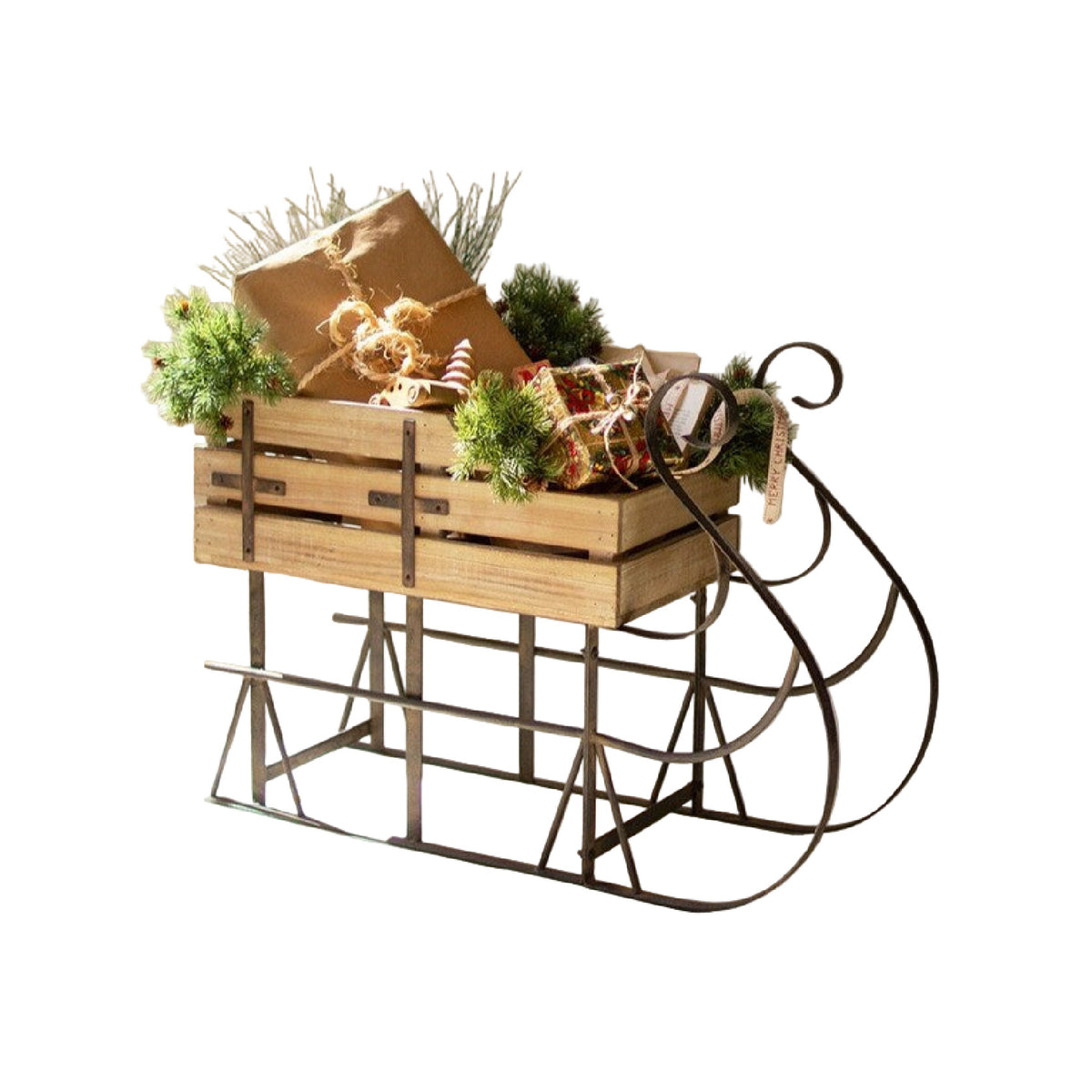 Wooden sleigh with Christmas decorations and presents on a white wooden floor.