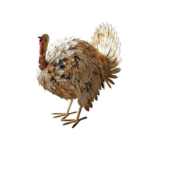 The Kalalou Antique White Painted Metal Turkey, featuring detailed feather and texture work, stands gracefully on two legs against a rustic antique white background, making it the perfect autumn decor.
