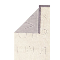 natural ABC area rug black tan playroom