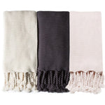 throw oversized knitted acrylic chunky rope-like tassels midnight navy off white blush pink oversized