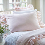 Pink and white ruffle bed set