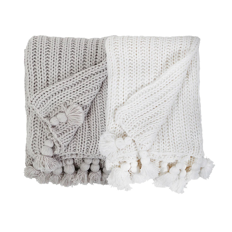 White and grey throws