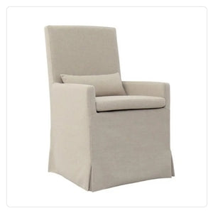 cream linen skirted dining chair with back pillow 
