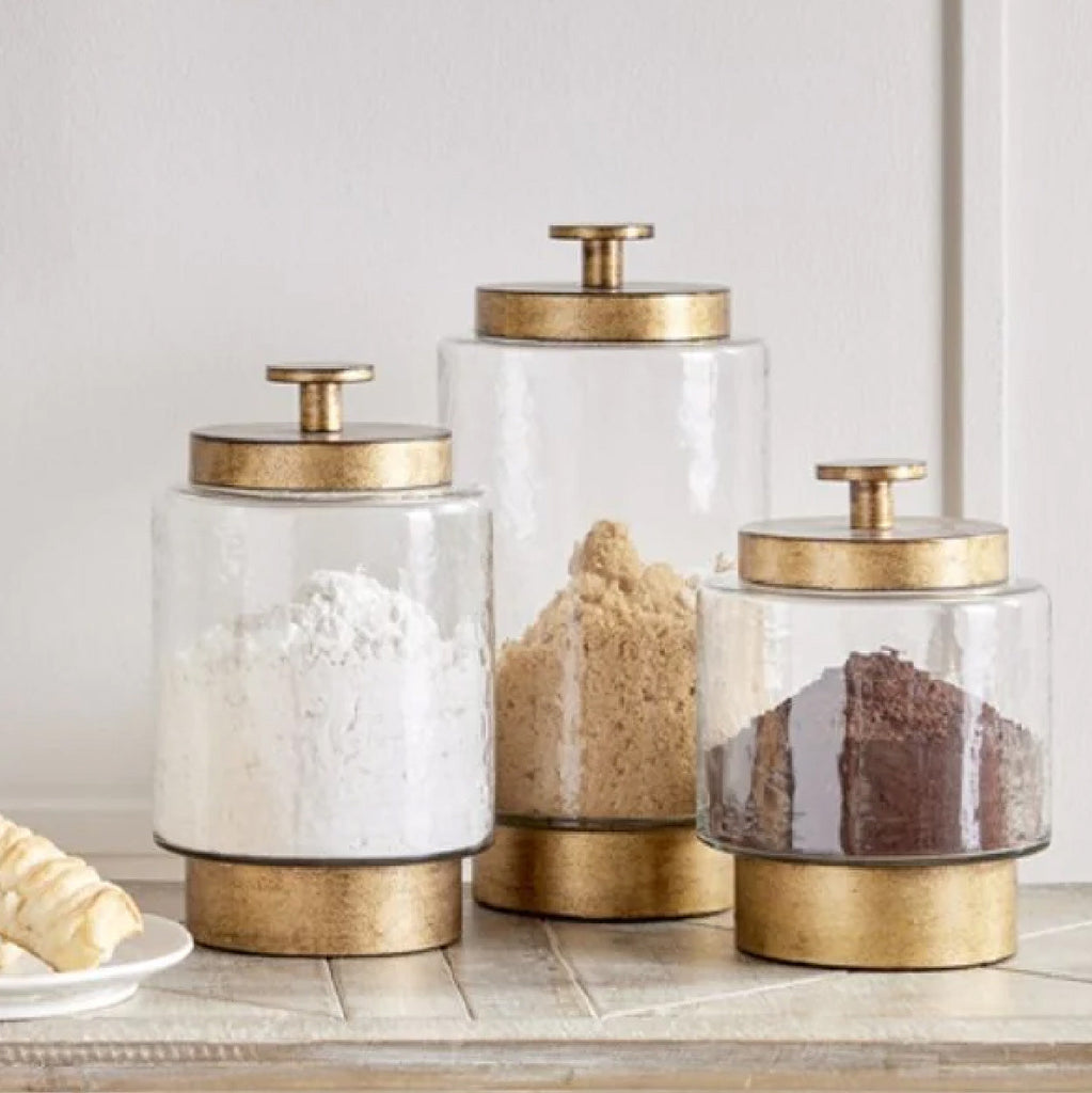 glass canisters with antique gold finish lids 