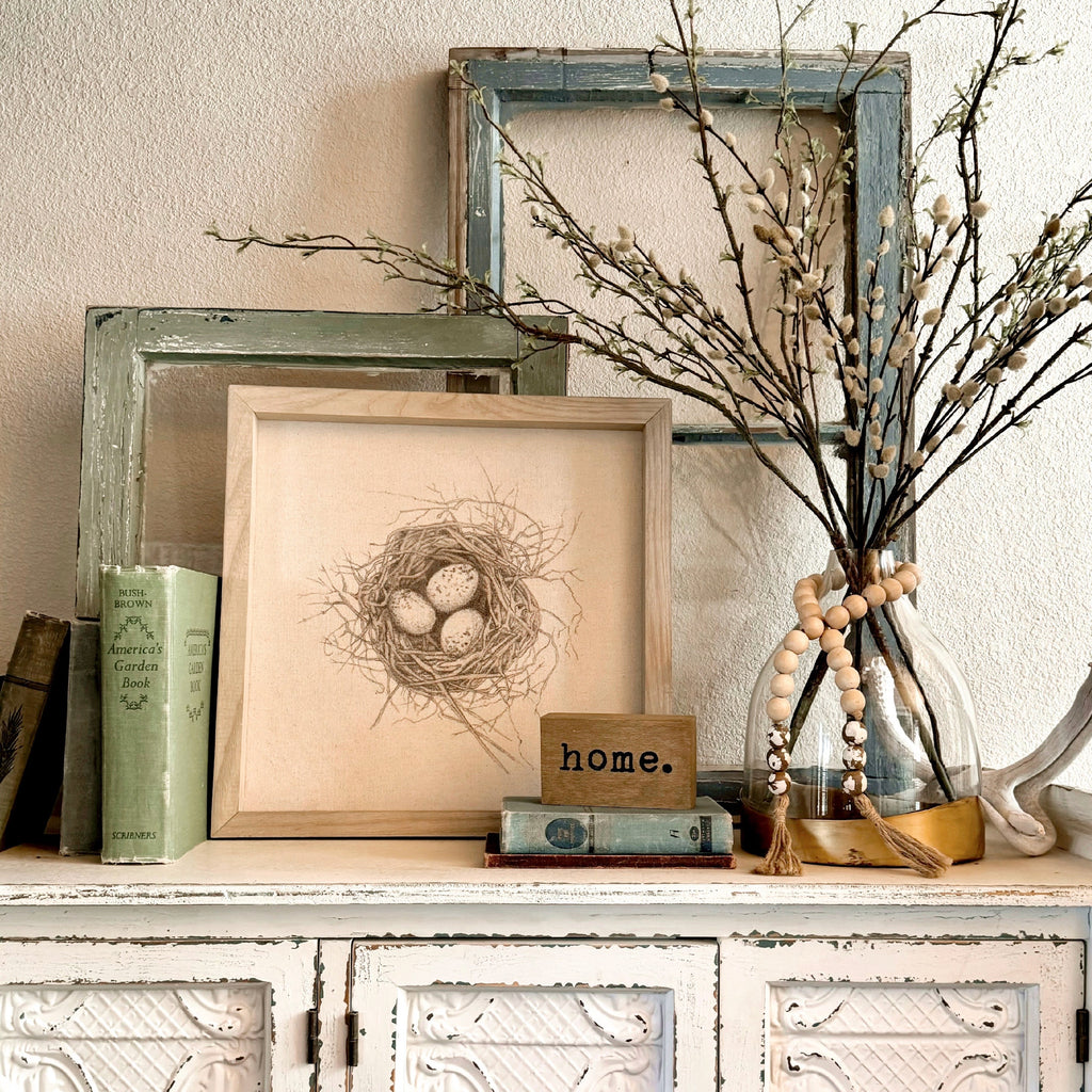 personalized photo frame on a white styled sideboard