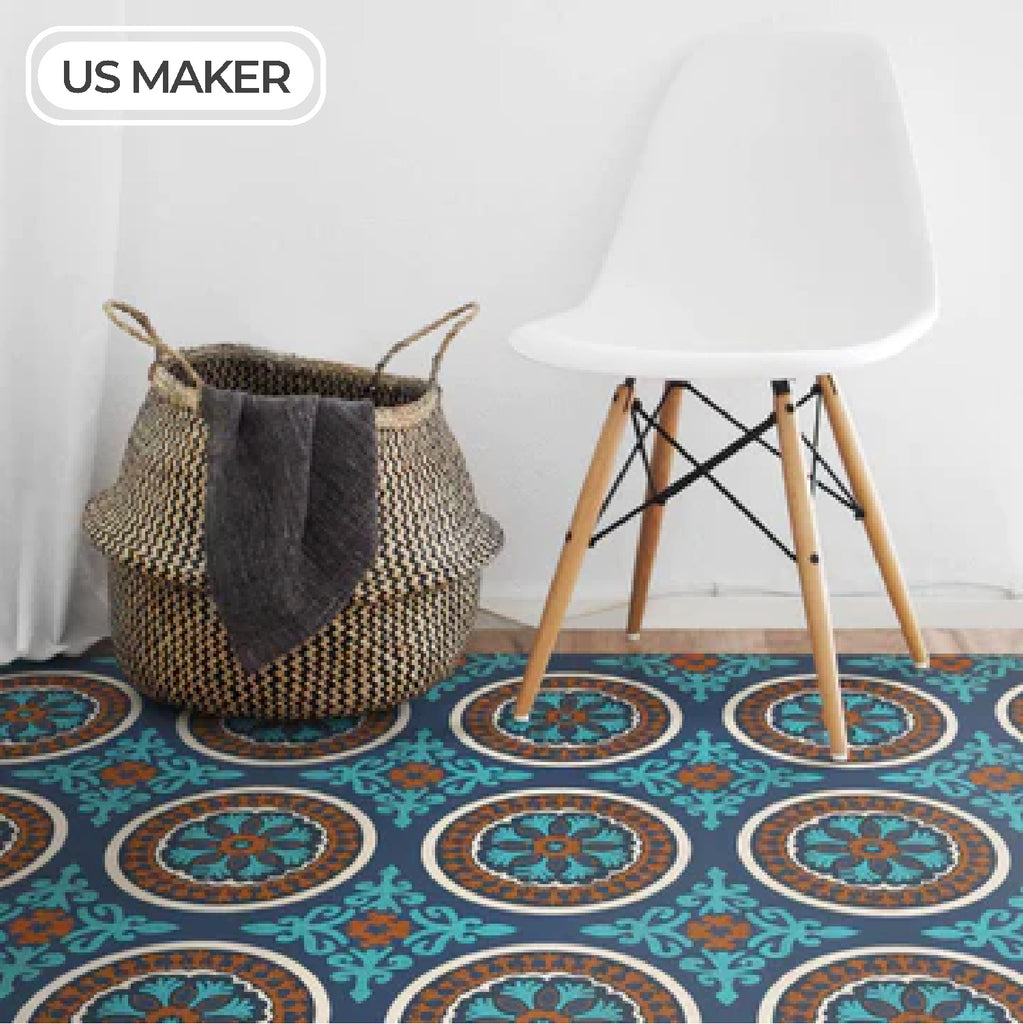 A vinyl rug in a blue and brown circle pattern