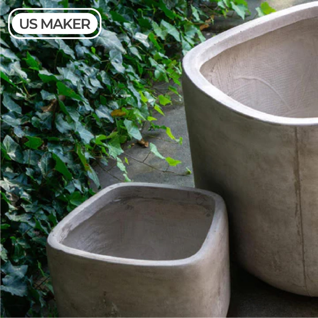 Large plant holders for the outside in a concrete finish