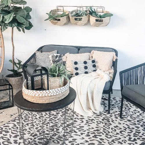 Fall decor on patio in black and grey