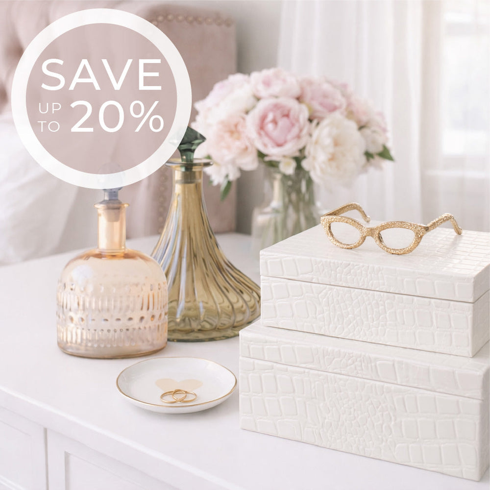 Lit endurance candle on tray with decor