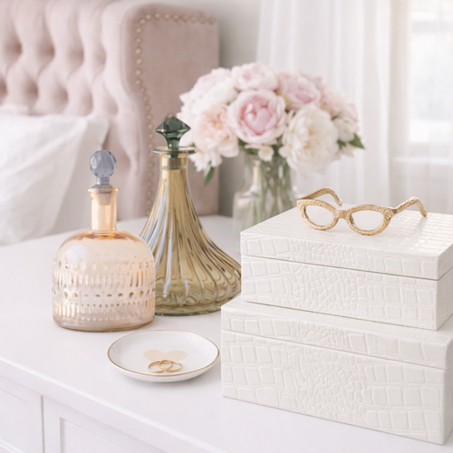 Lit endurance candle on tray with decor