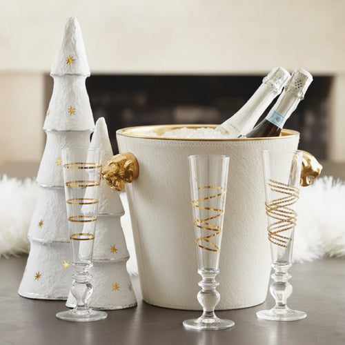 Champagne bucket and glass on coffee table tray