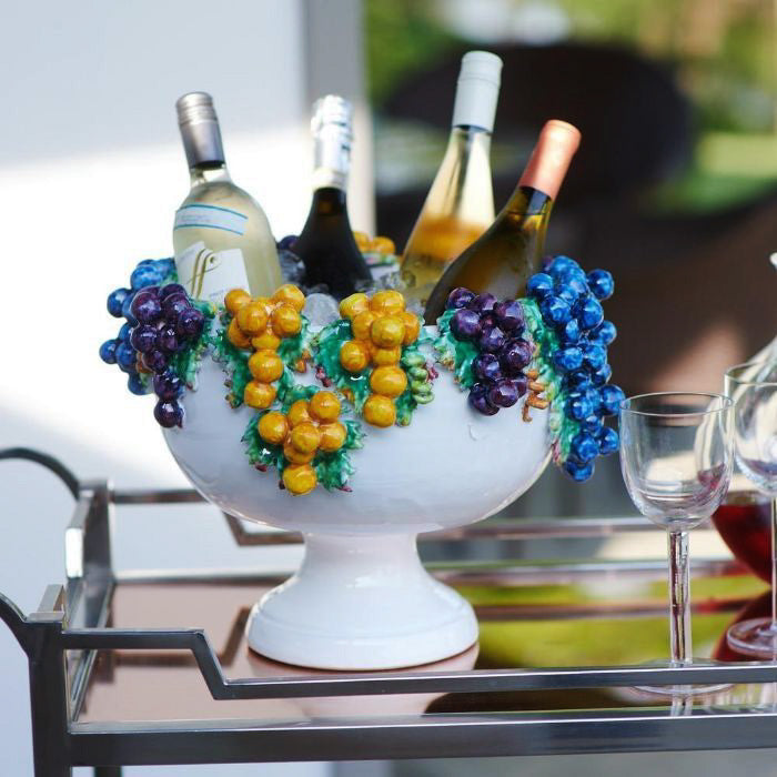 White ceramic bowl adorned with grapes