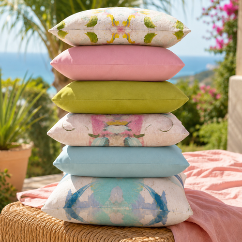 primary color pillows on white outdoor couch