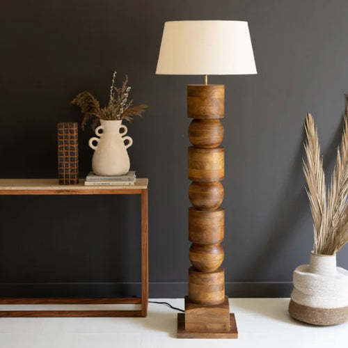 tall mango wood floor lamp in room