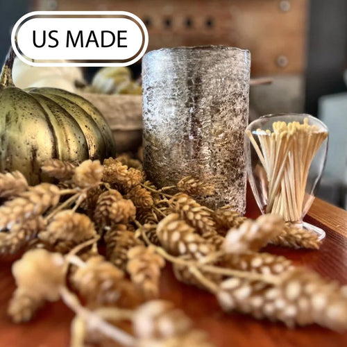 Driftwood candle on a fall themed tablescape with match cloche
