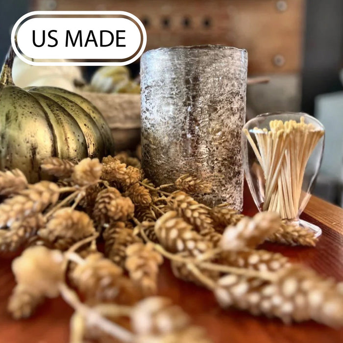 Driftwood candle on a fall themed tablescape with match cloche