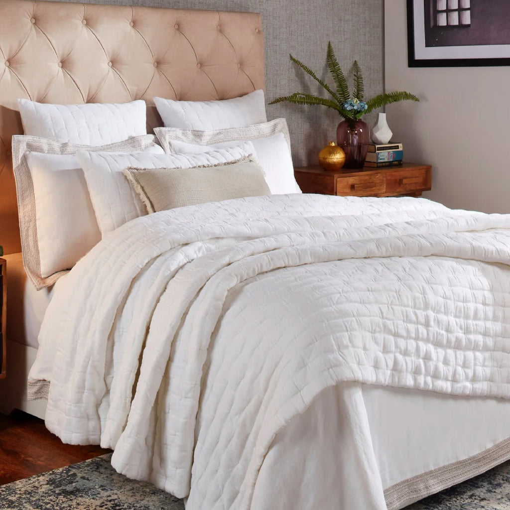 Black nightstand in neutral bedroom