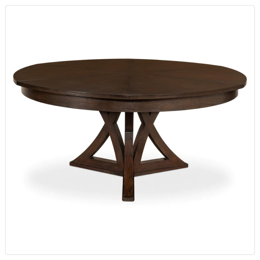 dark stained wood round expanding dining table