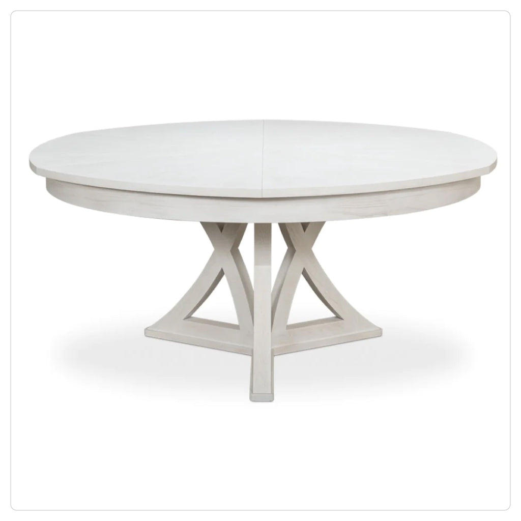 white washed wood round expanding dining table