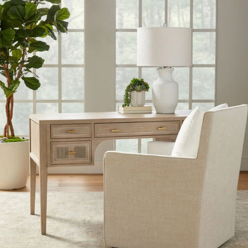 bamboo chair with woven desk and glass lamp 