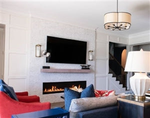 red chair blue sofa neutral living space 