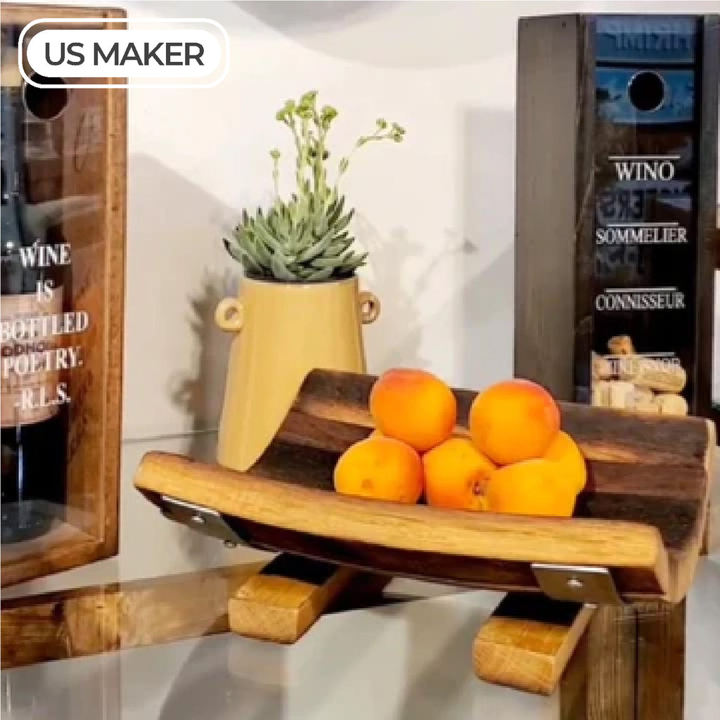 Wooden tray holding peaches and wine cork holder