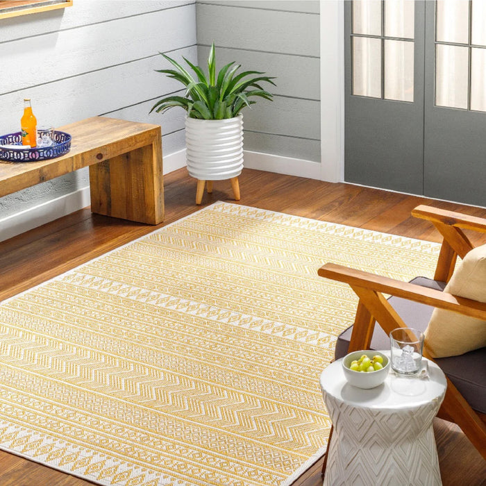 yellow white triangle outdoor rug