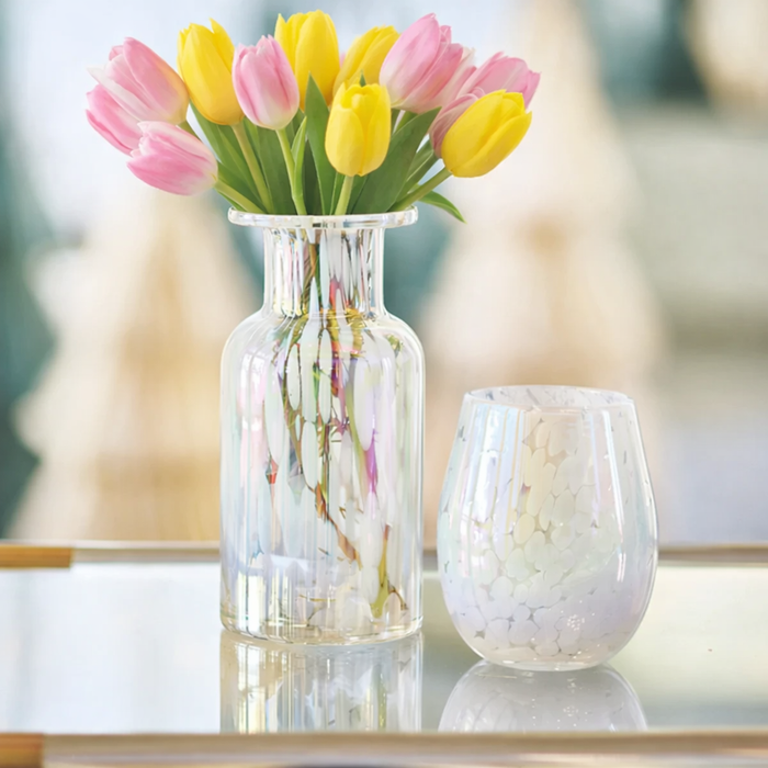 white spotted glass and vase with pink and yellow tulips