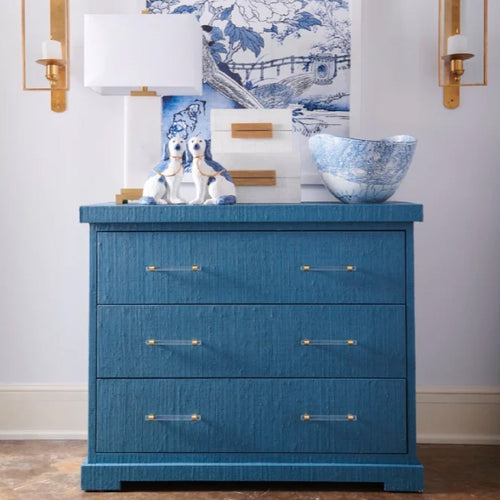blue dresser with decorative box set dog statues 