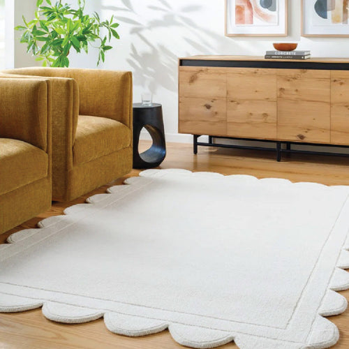 woven scalloped baskets with throw blankets 