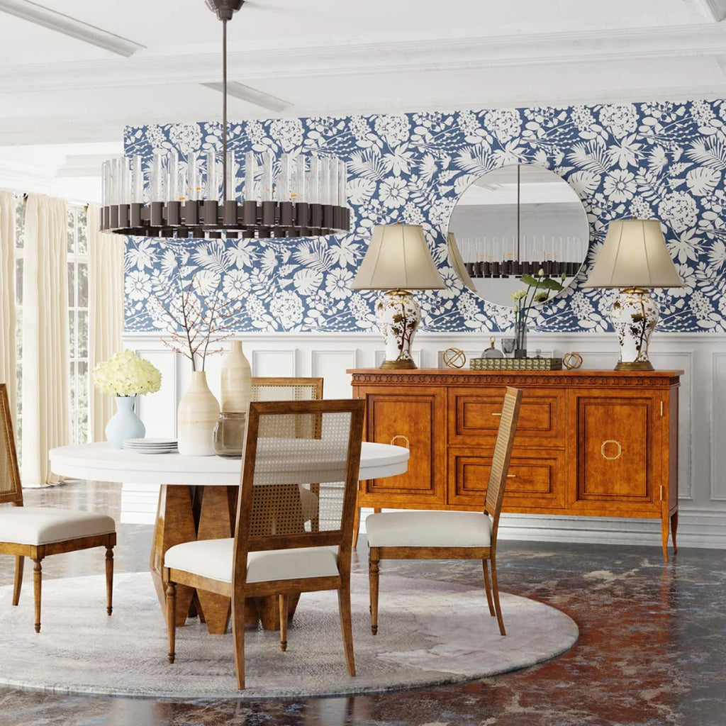 cream dining room with blue floral wallpaper wood console