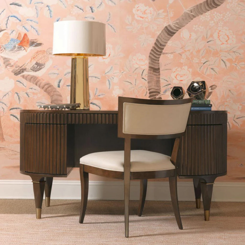 dark wood fluted desk and accent chair